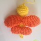 Colgante mariposa nos chifla de espaldas